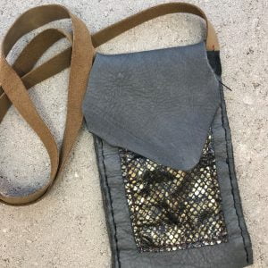 Gray and gold hand stitched leather bag